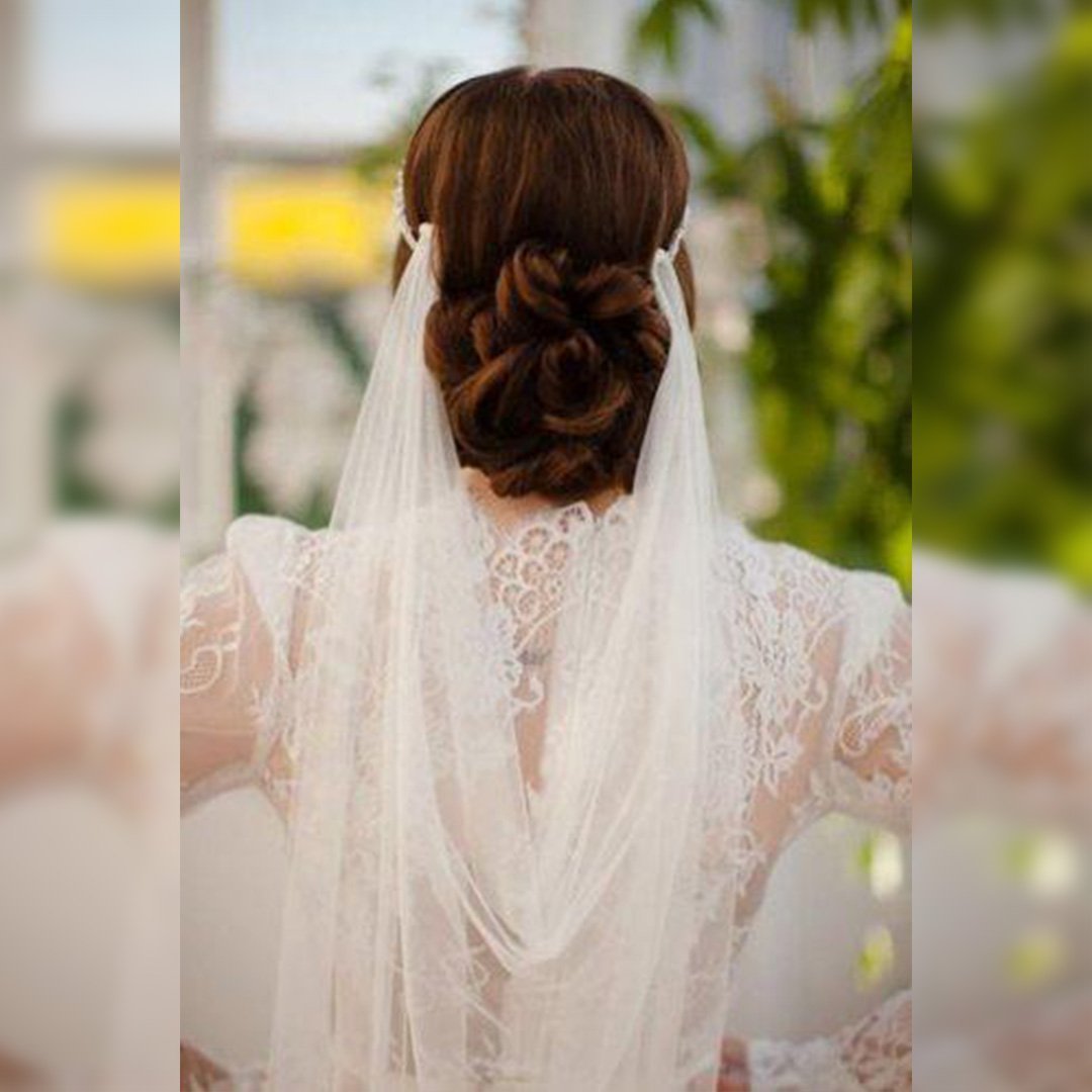 Прическа на свадьбу на длинные волосы с фатой